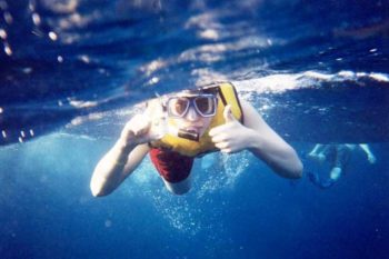 Snorkeling with thumbs up