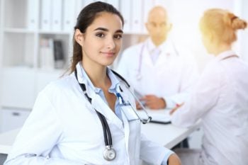 Portrait of young doctor in an international hospital.