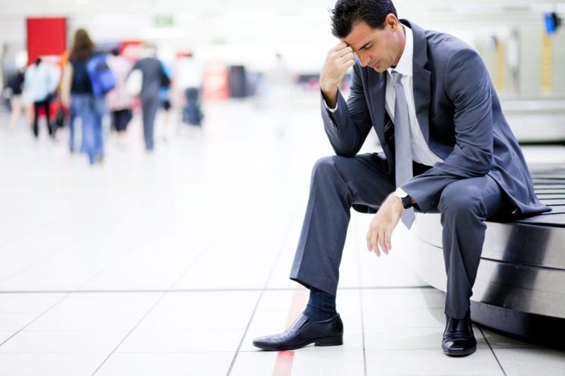 businessman lost his luggage at airport