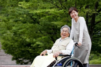 nurse and patient walk around healthcare building in China