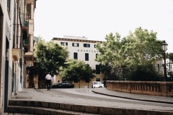 Man walking to hospital in Palma, Spain