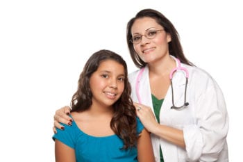 Mexican doctor and young girl