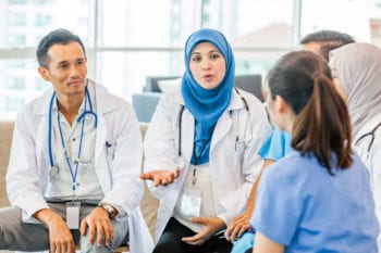 Malaysian doctors conducting a briefing