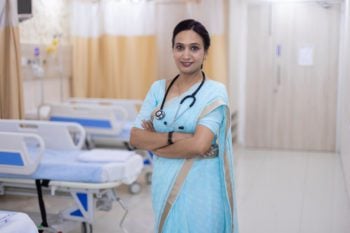 Female doctor in sari at hospital in India