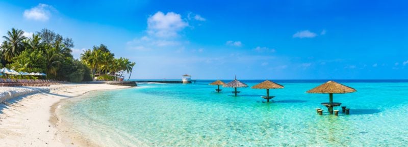 Sea parasol on an Indonesian beach in a sunny day