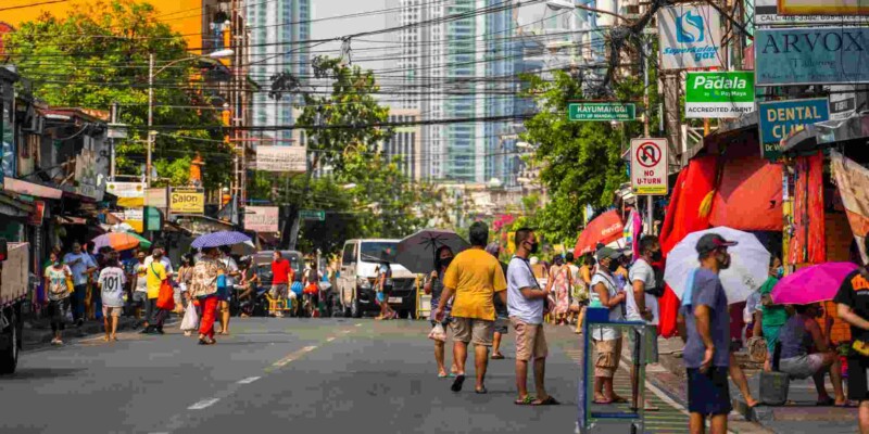 a busy street in Manila, Philippines, one of the cheapest countries to live in