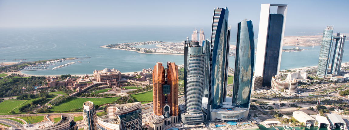Skyscrapers and modern hotels at Dubai Marina skyline, featuring high-rise buildings, luxury resorts, and waterfront views, showcasing urban development and international business hub.