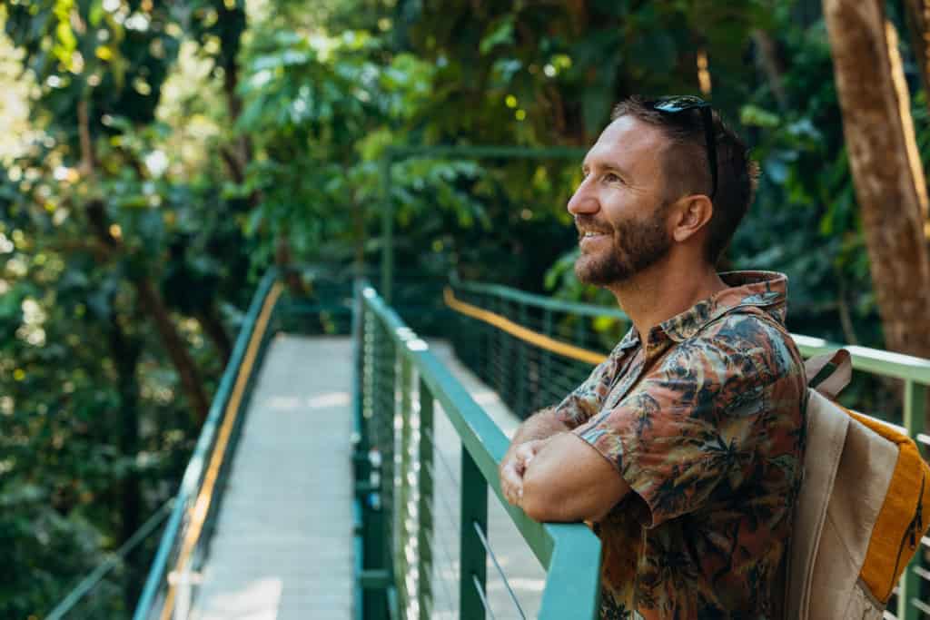 Connecting with nature at ICI conference in lush green forest environment.