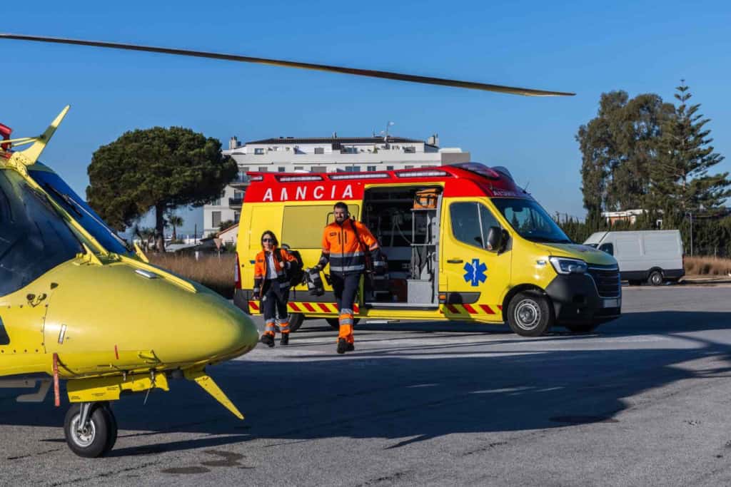Emergency medical helicopters and ambulances prepared for international travelers' health and safety needs.
