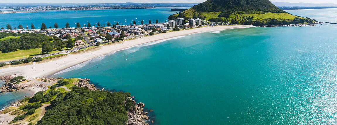 Aerial view of Sydney Harbour with Watsons Bay, lush green landscape, and the iconic green hill, highlighting the natural beauty of Sydney, Australia, perfect for urban and outdoor lifestyle keywords.