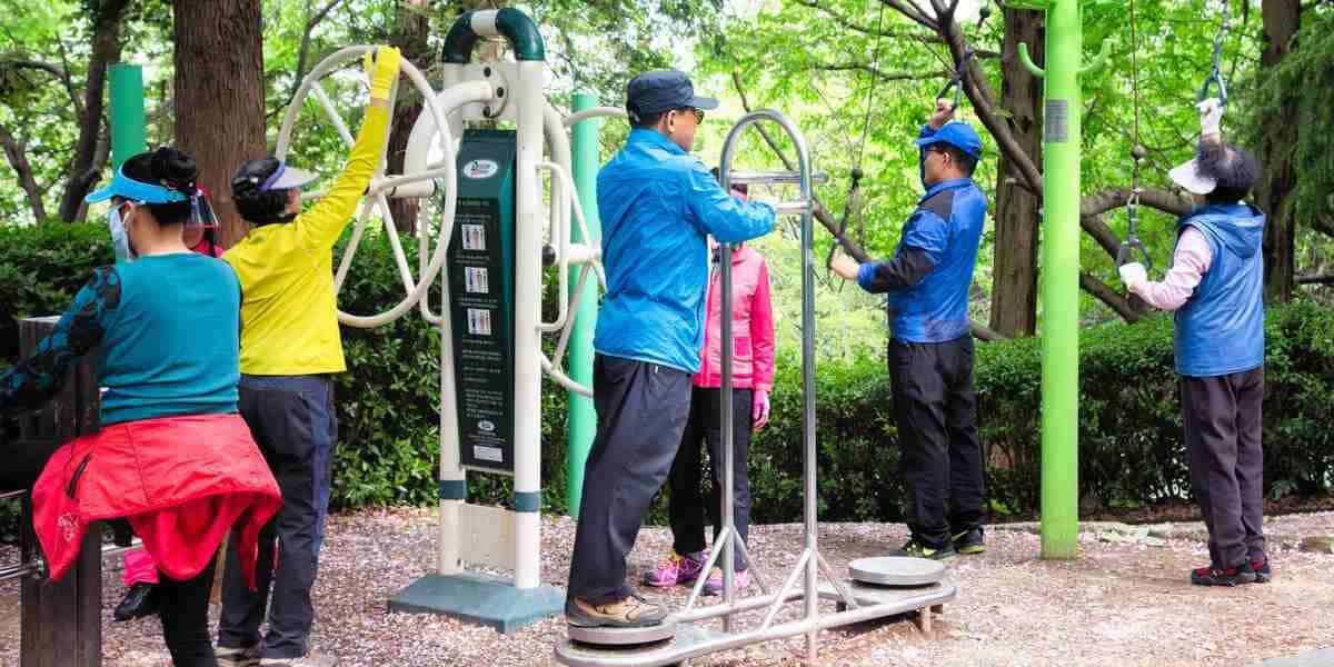 a group of seniors exercising in a public park in South Korea, where the life expectancy per country is one of the highest in the world