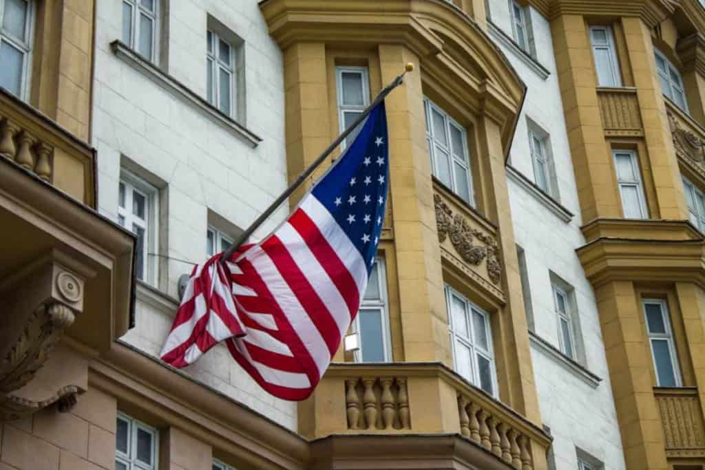 The American flag flapping in the wind outside the US embassy in Moscow, Russia