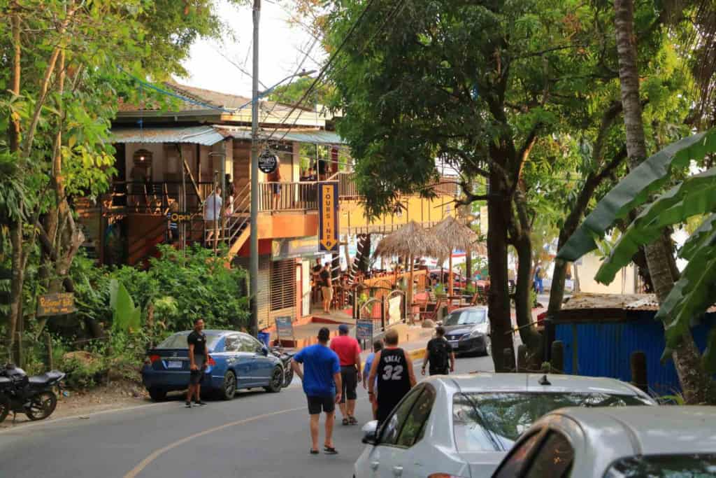 a road leading to the gate of National Park Manuel Antonio, one of the safest places to live in Costa Rica