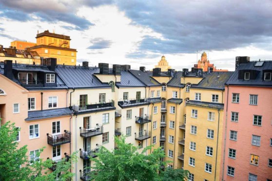 Beautiful Swedish apartment buildings with colorful facades and balconies.