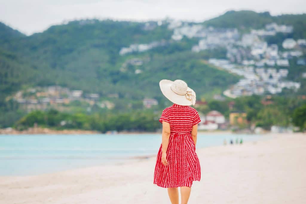 woman relaxing at Chaweng Beach in Koh Samui, Thailand