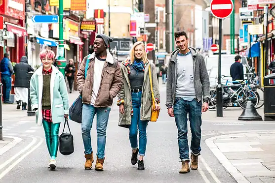 International Citizens Walking in City Street.