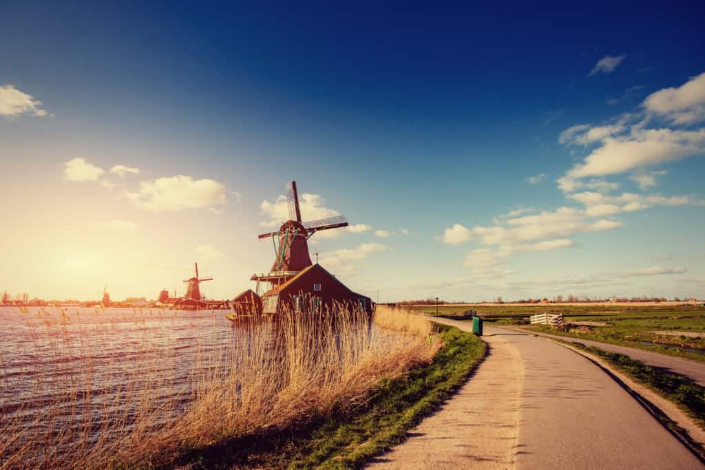 Historic windmills in the Netherlands symbolize Dutch heritage and are popular tourist attractions.