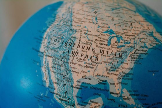 An image of a globe highlighting North America and the Caribbean, illustrating international citizenship and investment opportunities.