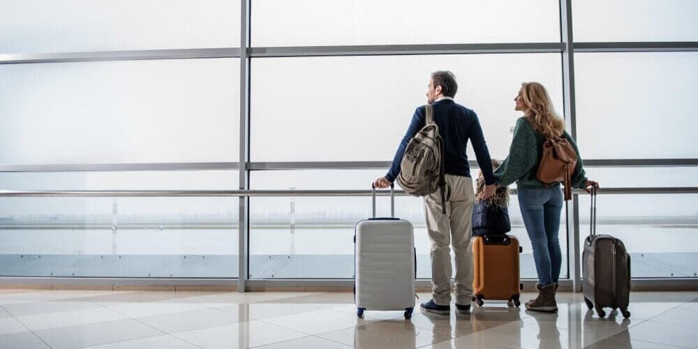 travelers waiting for their delayed flight