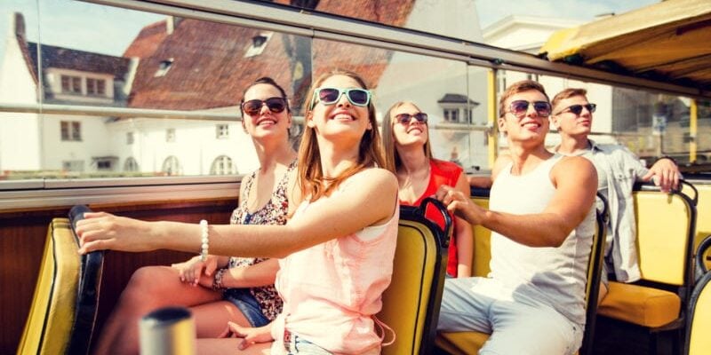 tourists on a tour bus